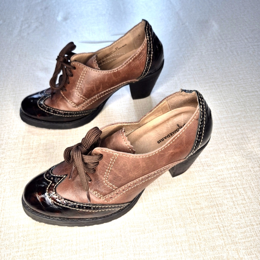Brown and Black Heeled Boots by Wonders